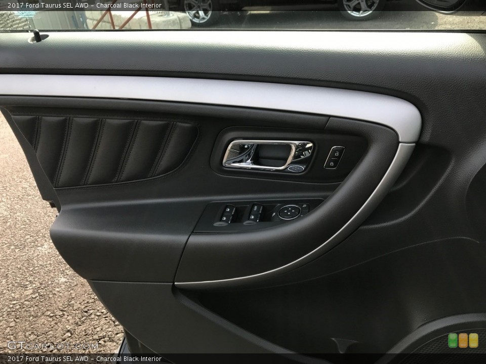 Charcoal Black Interior Door Panel for the 2017 Ford Taurus SEL AWD #119378887