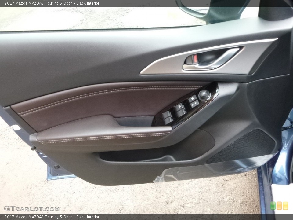 Black Interior Door Panel for the 2017 Mazda MAZDA3 Touring 5 Door #119506552