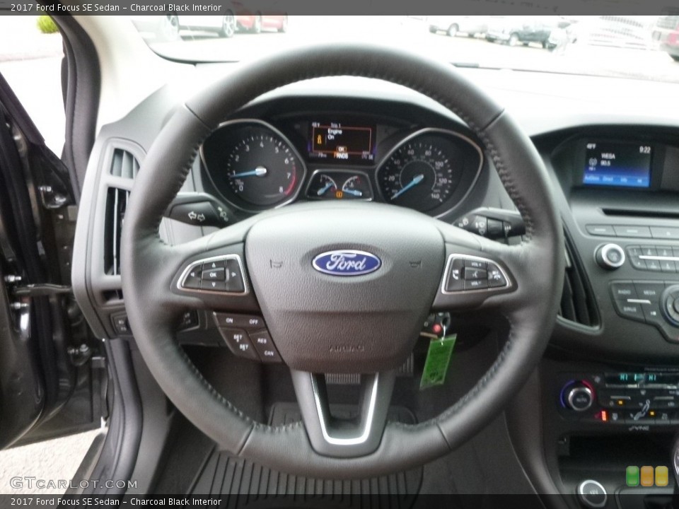 Charcoal Black Interior Steering Wheel for the 2017 Ford Focus SE Sedan #119547133