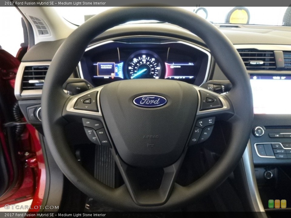 Medium Light Stone Interior Steering Wheel for the 2017 Ford Fusion Hybrid SE #119553726