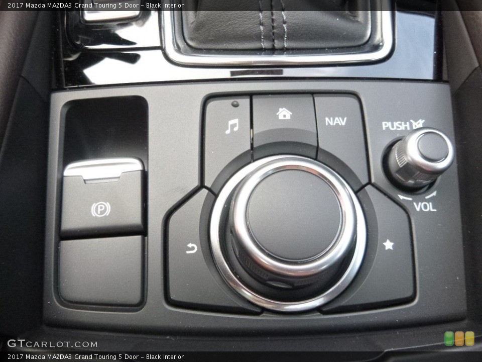 Black Interior Controls for the 2017 Mazda MAZDA3 Grand Touring 5 Door #119610750