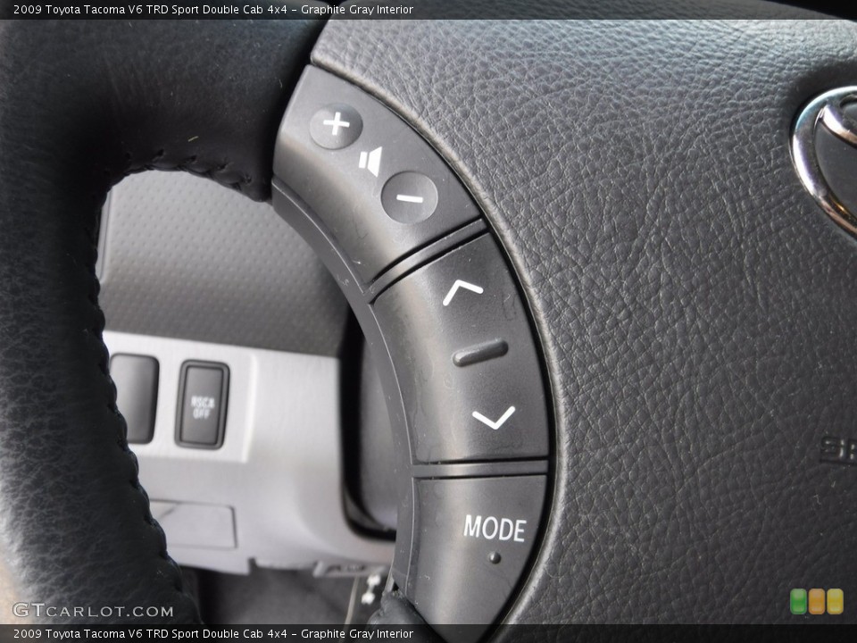 Graphite Gray Interior Controls for the 2009 Toyota Tacoma V6 TRD Sport Double Cab 4x4 #119698143
