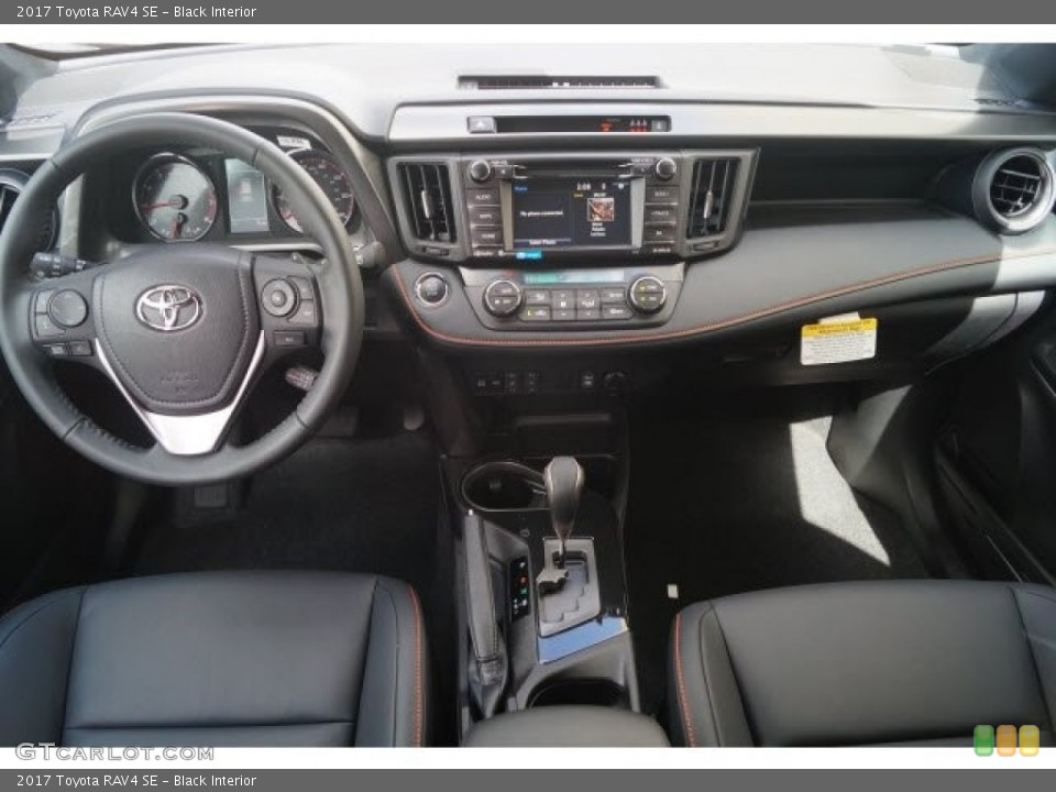 Black Interior Dashboard for the 2017 Toyota RAV4 SE #119726421