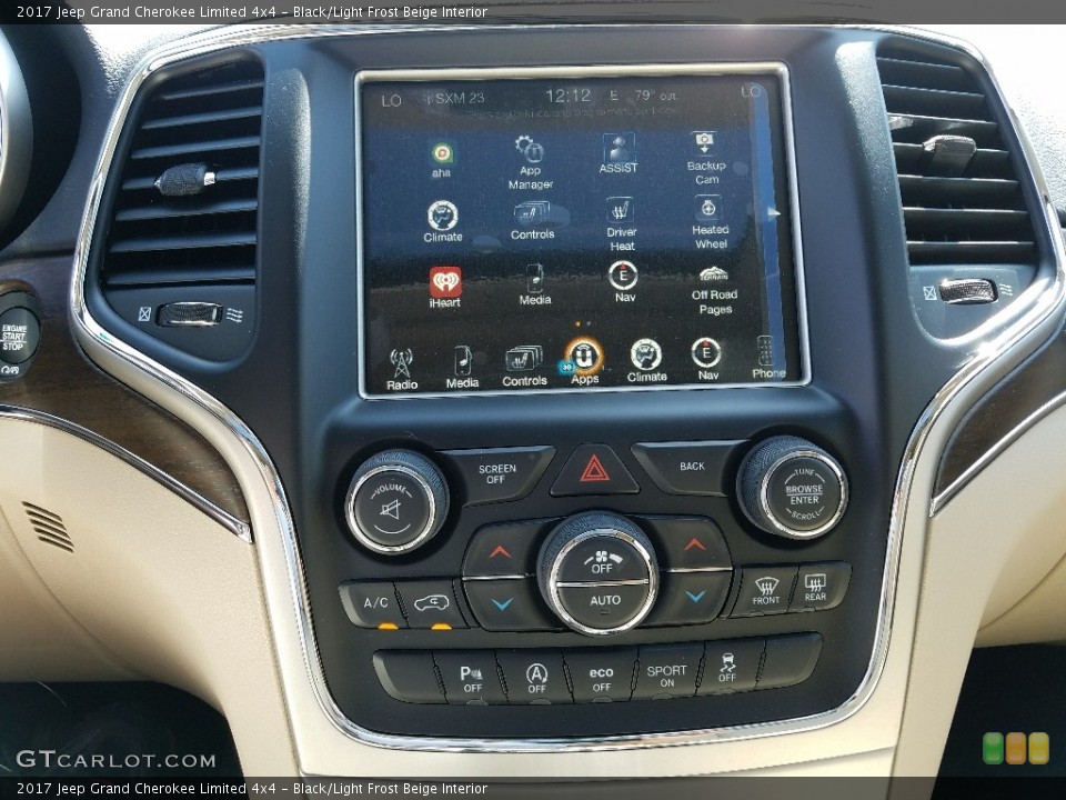 Black/Light Frost Beige Interior Controls for the 2017 Jeep Grand Cherokee Limited 4x4 #119796155