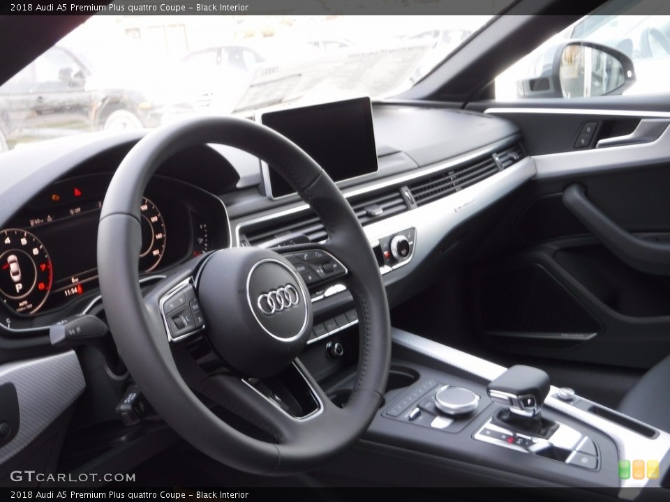 Black Interior Dashboard for the 2018 Audi A5 Premium Plus quattro Coupe #119872493