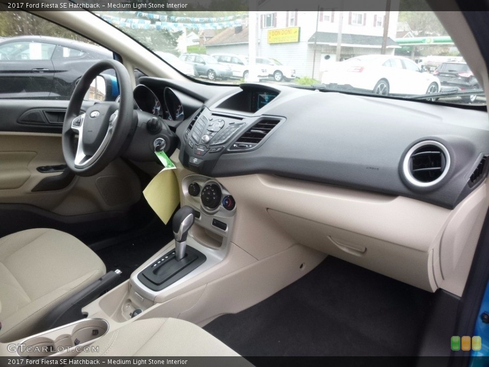 Medium Light Stone Interior Dashboard for the 2017 Ford Fiesta SE Hatchback #119980486