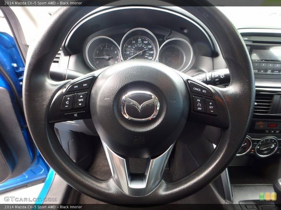 Black Interior Steering Wheel for the 2014 Mazda CX-5 Sport AWD #120002769