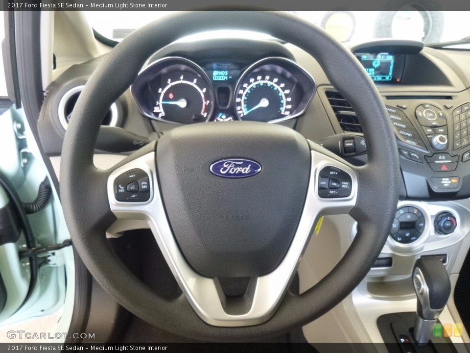 Medium Light Stone Interior Steering Wheel for the 2017 Ford Fiesta SE Sedan #120224808