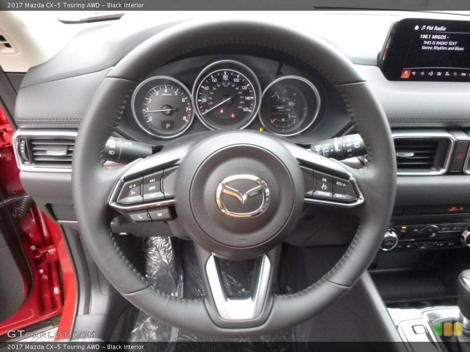 Black Interior Steering Wheel for the 2017 Mazda CX-5 Touring AWD #120290735