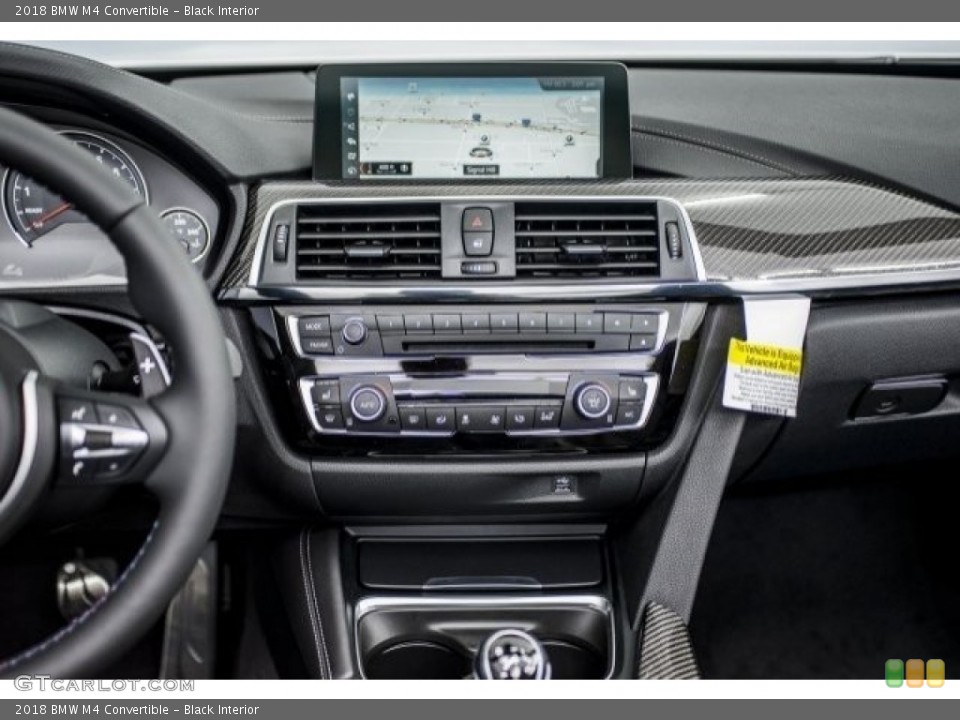Black Interior Controls for the 2018 BMW M4 Convertible #120317111