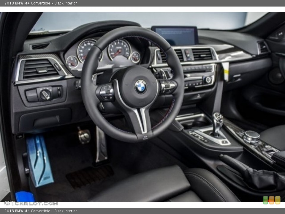 Black Interior Dashboard for the 2018 BMW M4 Convertible #120317115