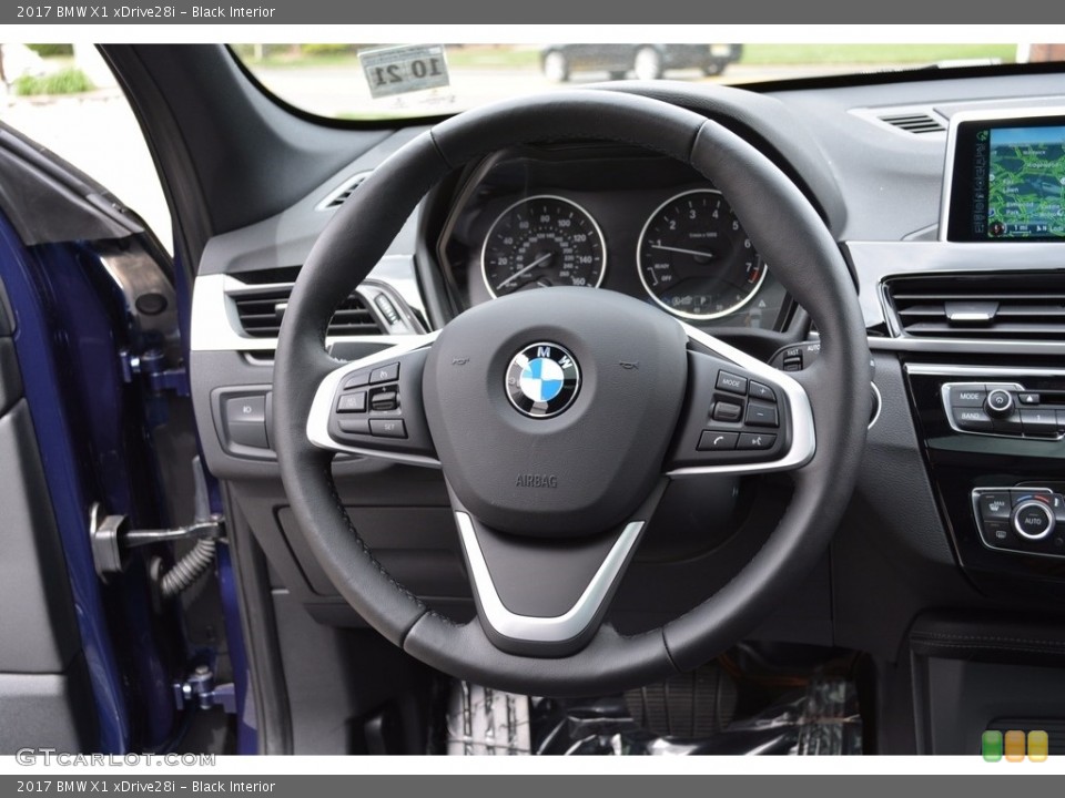Black Interior Steering Wheel for the 2017 BMW X1 xDrive28i #120345607
