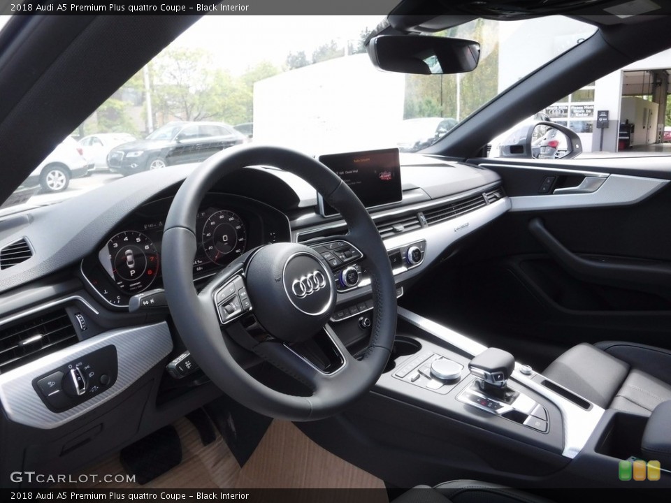 Black Interior Dashboard for the 2018 Audi A5 Premium Plus quattro Coupe #120395533