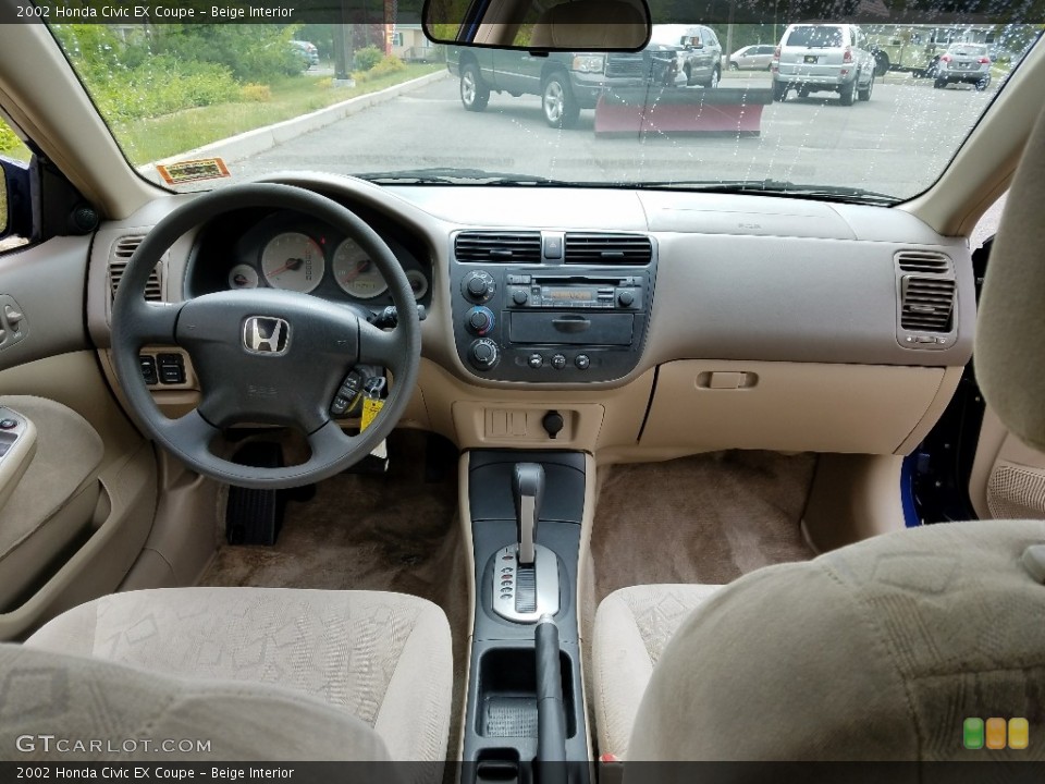 Beige Interior Dashboard for the 2002 Honda Civic EX Coupe #120403022