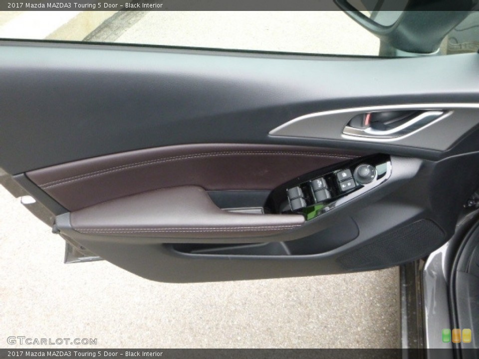 Black Interior Door Panel for the 2017 Mazda MAZDA3 Touring 5 Door #120458441