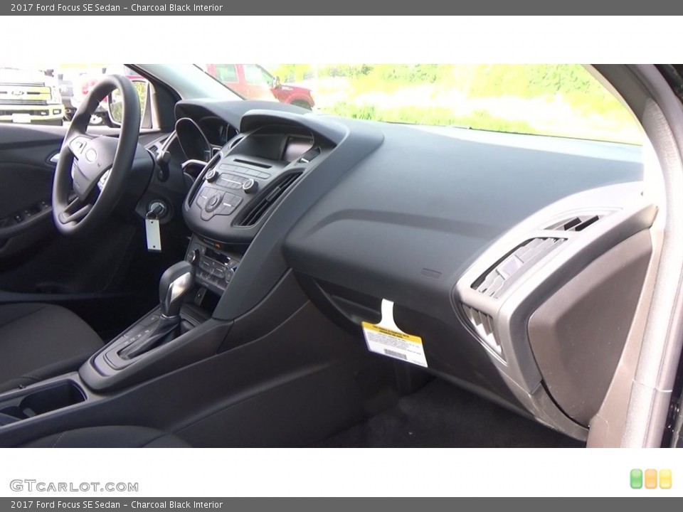 Charcoal Black Interior Dashboard for the 2017 Ford Focus SE Sedan #120459851