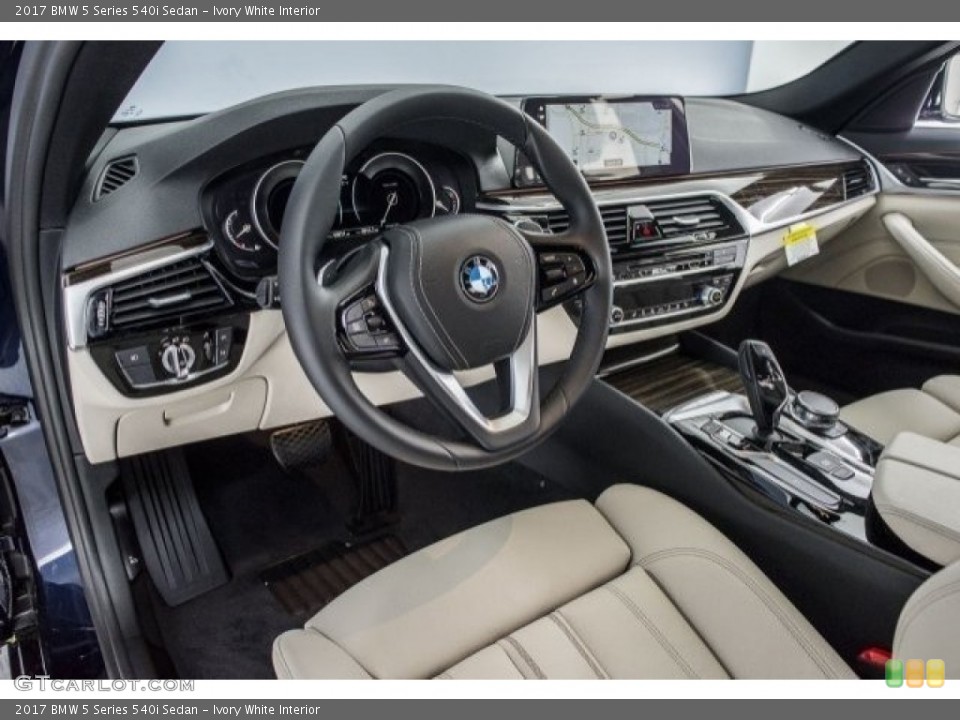 Ivory White Interior Dashboard for the 2017 BMW 5 Series 540i Sedan #120721769