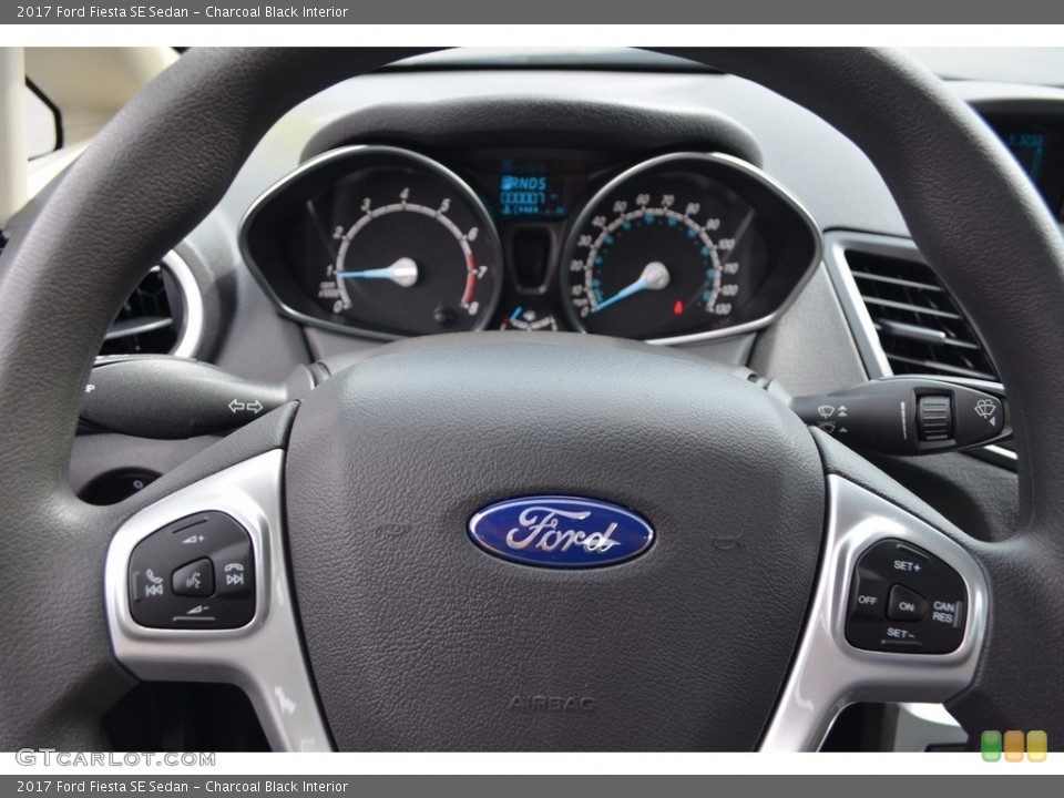 Charcoal Black Interior Steering Wheel for the 2017 Ford Fiesta SE Sedan #120744556