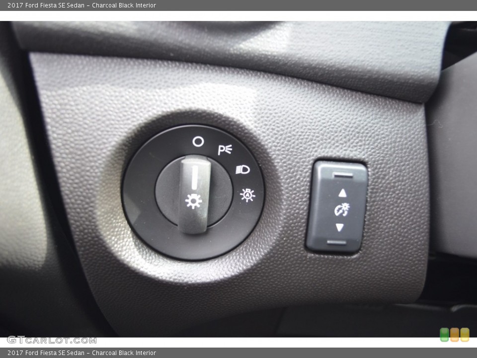 Charcoal Black Interior Controls for the 2017 Ford Fiesta SE Sedan #120744575