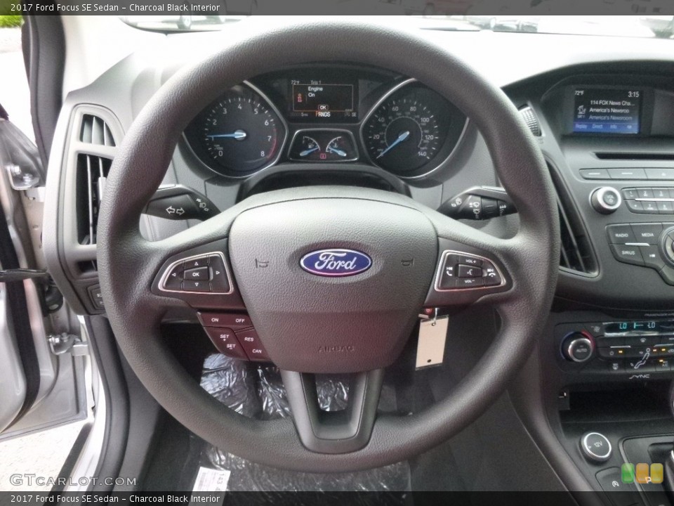 Charcoal Black Interior Steering Wheel for the 2017 Ford Focus SE Sedan #120759562