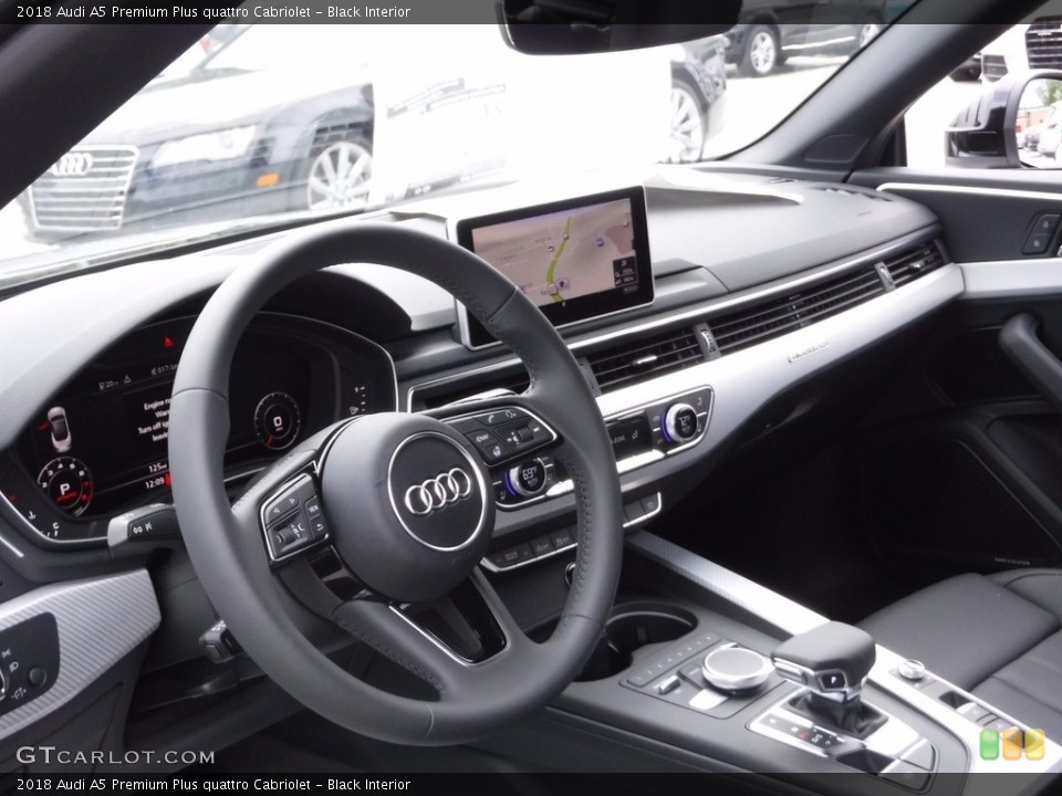 Black Interior Dashboard for the 2018 Audi A5 Premium Plus quattro Cabriolet #120891203