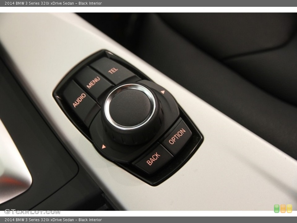 Black Interior Controls for the 2014 BMW 3 Series 320i xDrive Sedan #120928105