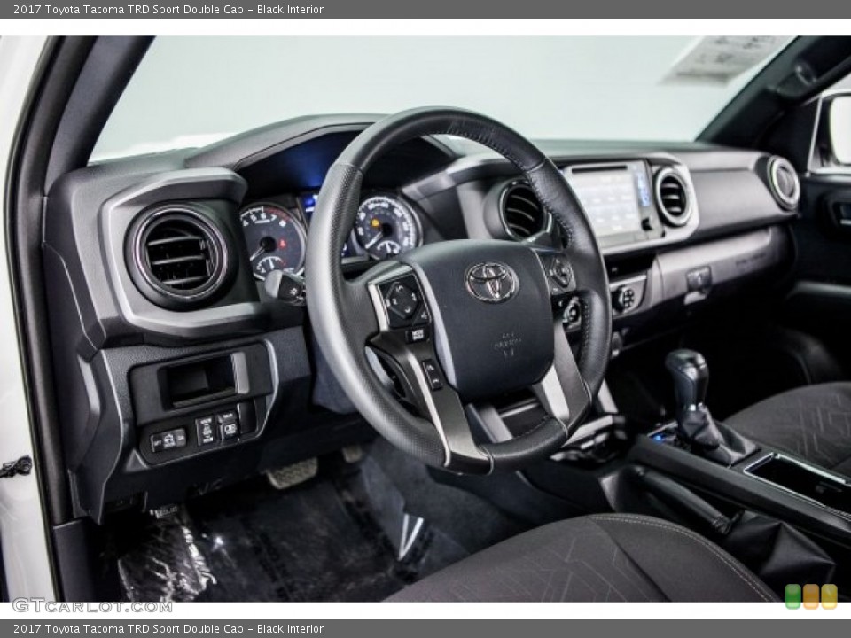 Black Interior Dashboard for the 2017 Toyota Tacoma TRD Sport Double Cab #120947574