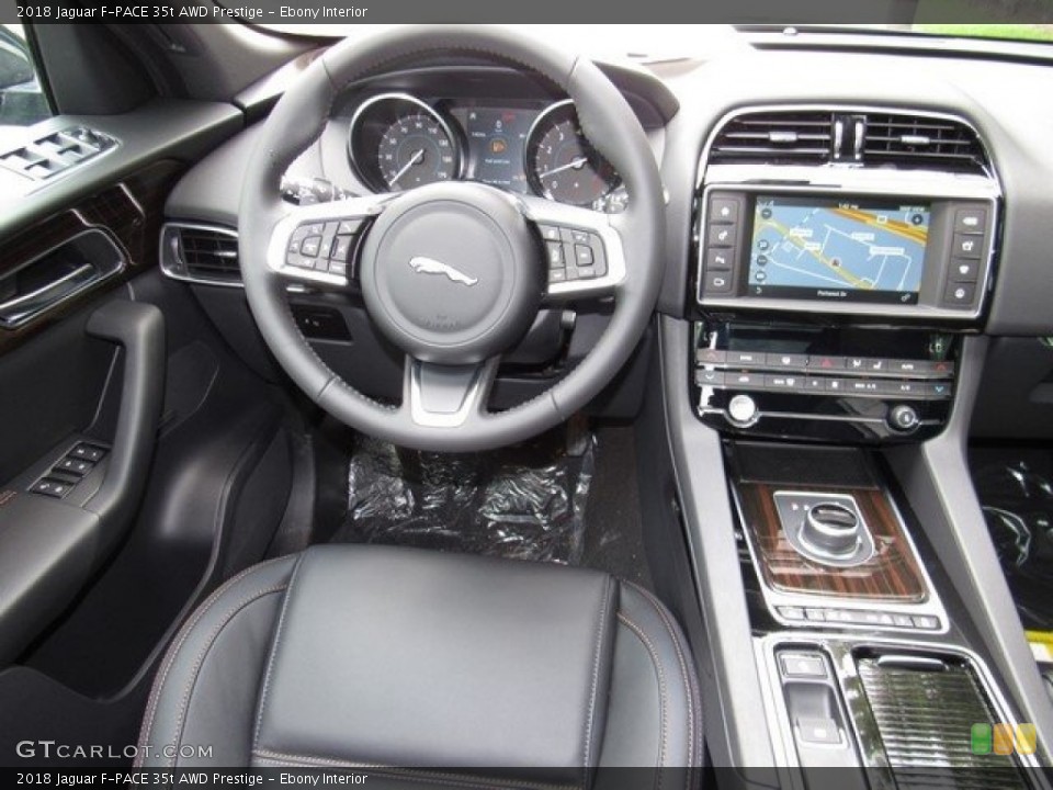 Ebony Interior Dashboard for the 2018 Jaguar F-PACE 35t AWD Prestige #121004694