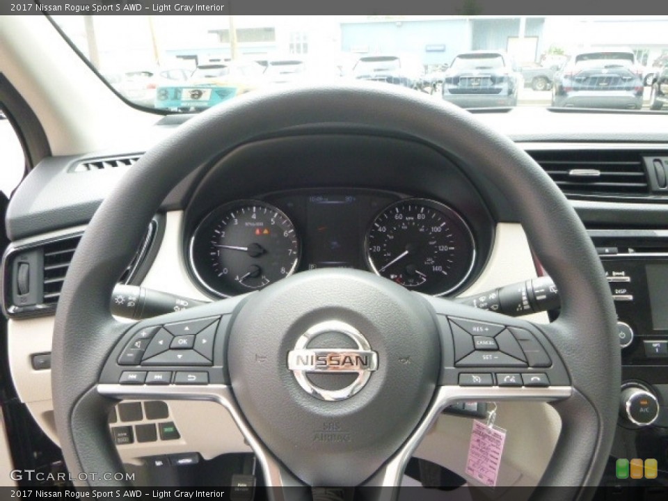 Light Gray Interior Steering Wheel for the 2017 Nissan Rogue Sport S AWD #121117127