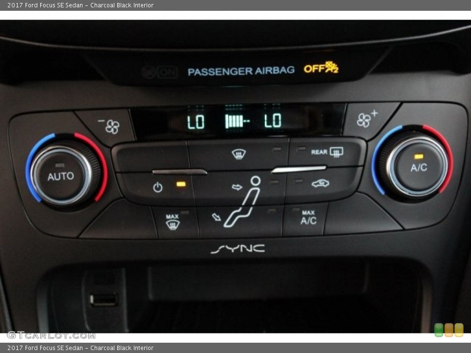 Charcoal Black Interior Controls for the 2017 Ford Focus SE Sedan #121128441