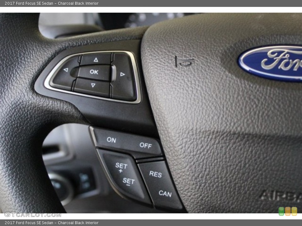 Charcoal Black Interior Controls for the 2017 Ford Focus SE Sedan #121128459