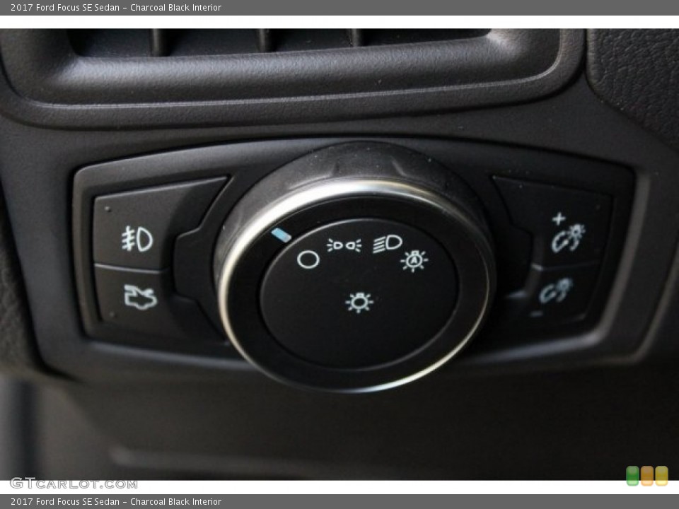Charcoal Black Interior Controls for the 2017 Ford Focus SE Sedan #121128490