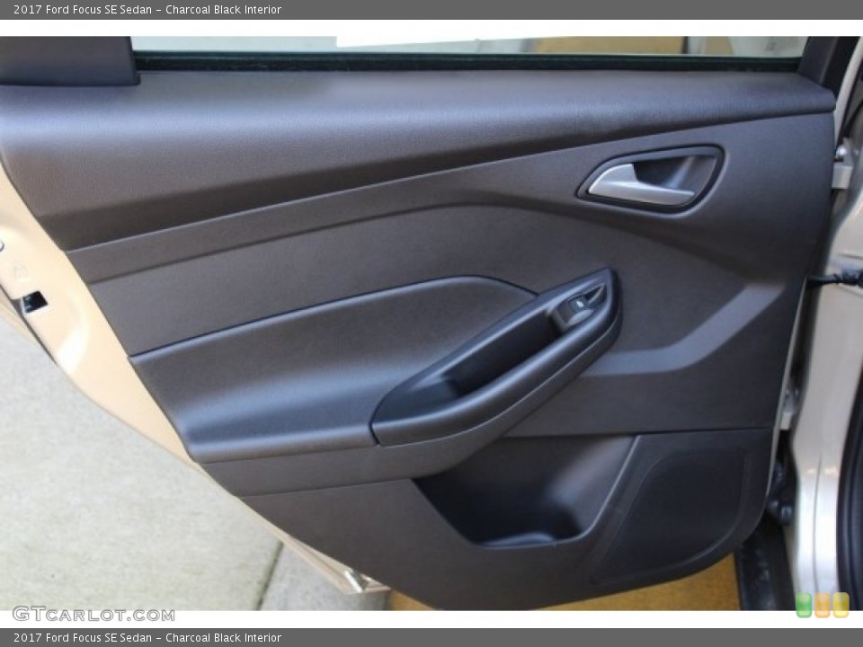 Charcoal Black Interior Door Panel for the 2017 Ford Focus SE Sedan #121128507