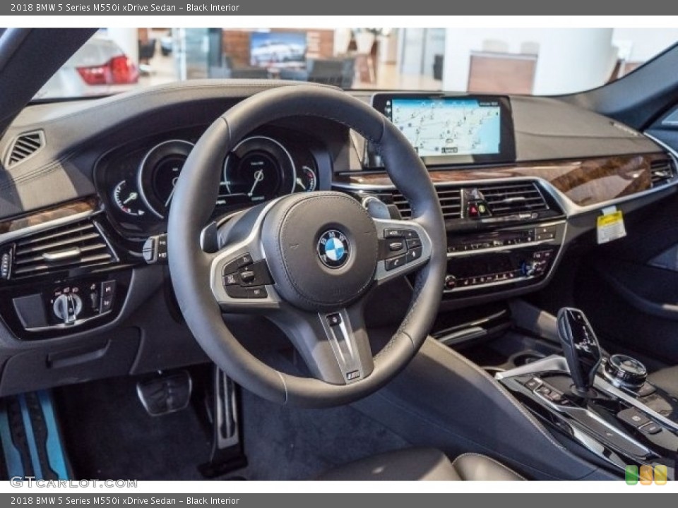 Black Interior Dashboard for the 2018 BMW 5 Series M550i xDrive Sedan #121131301