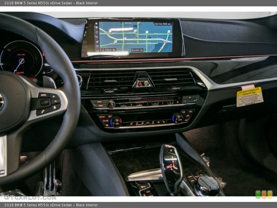 Black Interior Controls for the 2018 BMW 5 Series M550i xDrive Sedan #121371584