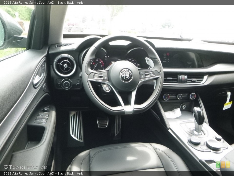 Black/Black Interior Dashboard for the 2018 Alfa Romeo Stelvio Sport AWD #121632558