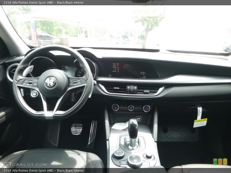 Black/Black Interior Dashboard for the 2018 Alfa Romeo Stelvio Sport AWD #121632573