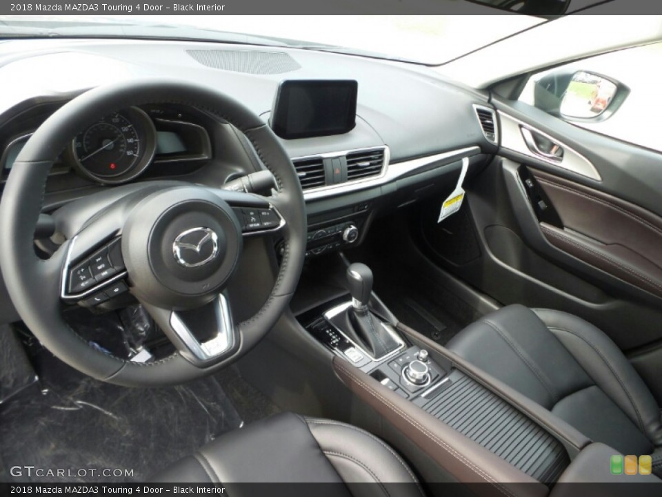 Black Interior Photo for the 2018 Mazda MAZDA3 Touring 4 Door #121785492