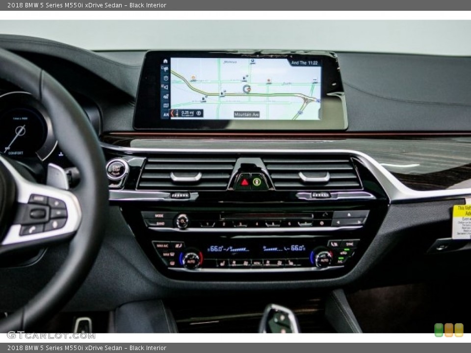 Black Interior Controls for the 2018 BMW 5 Series M550i xDrive Sedan #121796879