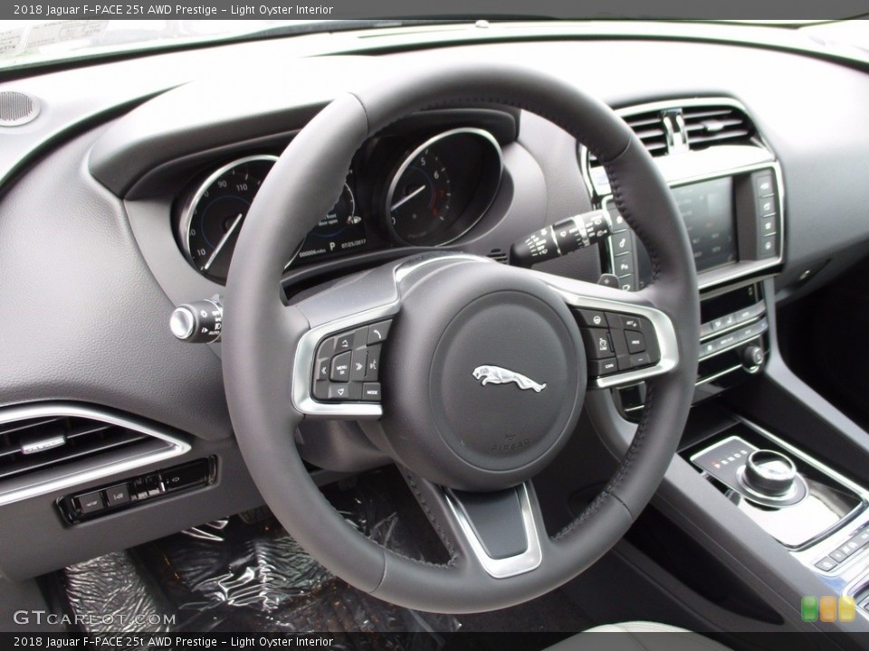 Light Oyster Interior Steering Wheel for the 2018 Jaguar F-PACE 25t AWD Prestige #121827471