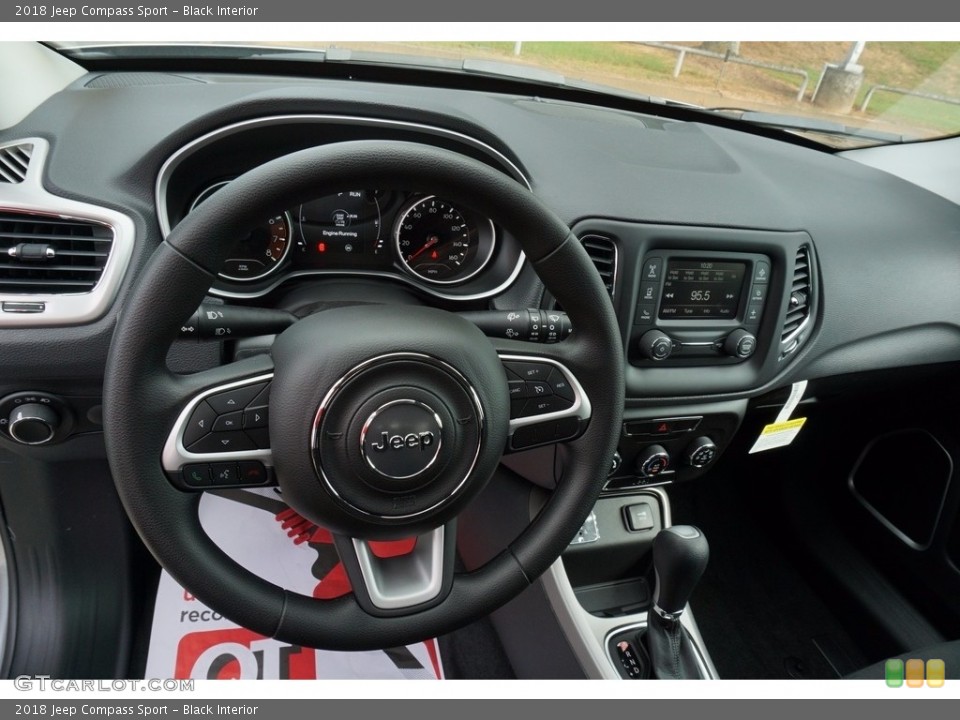 Black Interior Dashboard for the 2018 Jeep Compass Sport #122195364