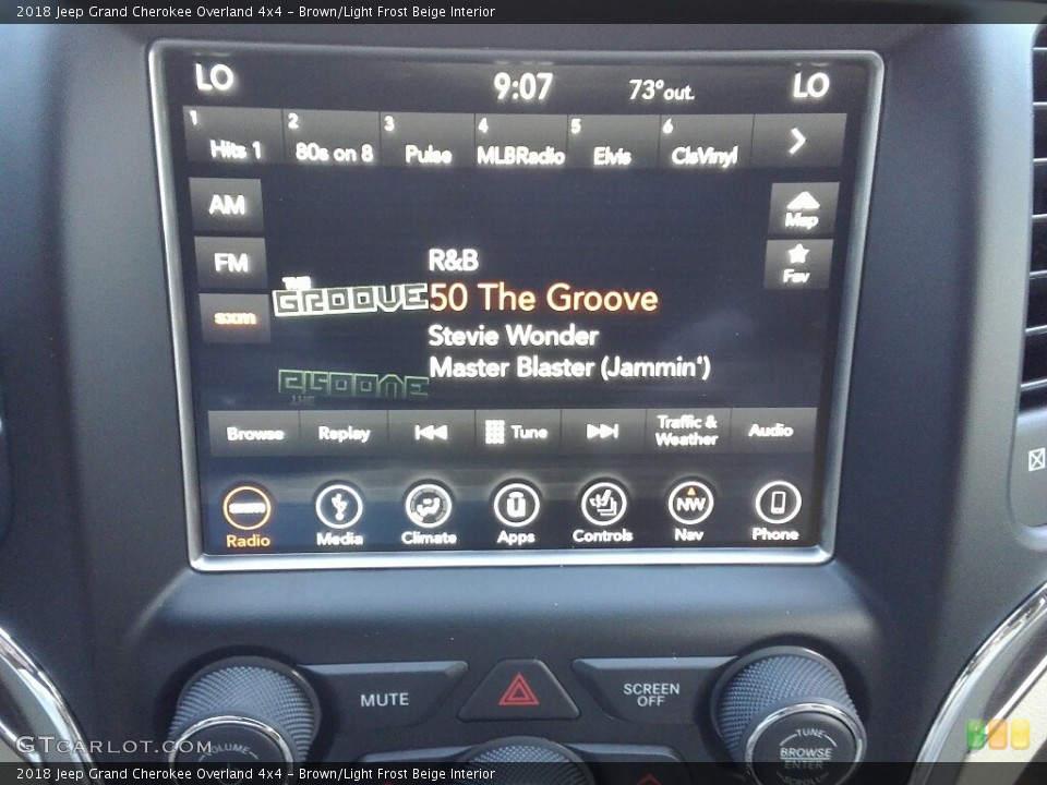 Brown/Light Frost Beige Interior Controls for the 2018 Jeep Grand Cherokee Overland 4x4 #122383171