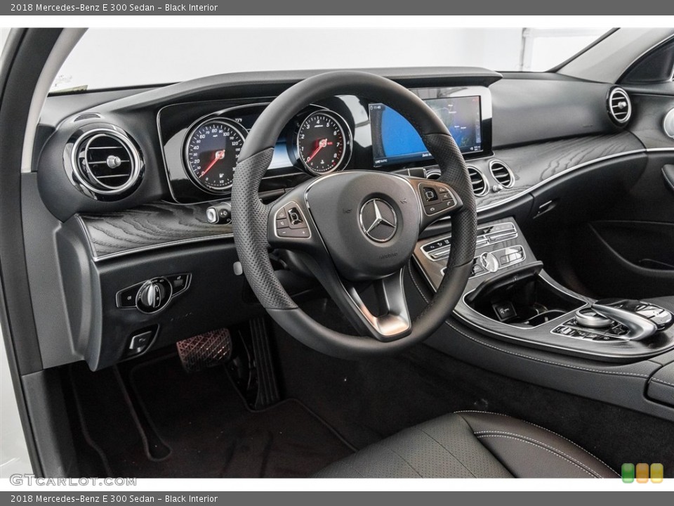 Black Interior Steering Wheel for the 2018 Mercedes-Benz E 300 Sedan #122431061