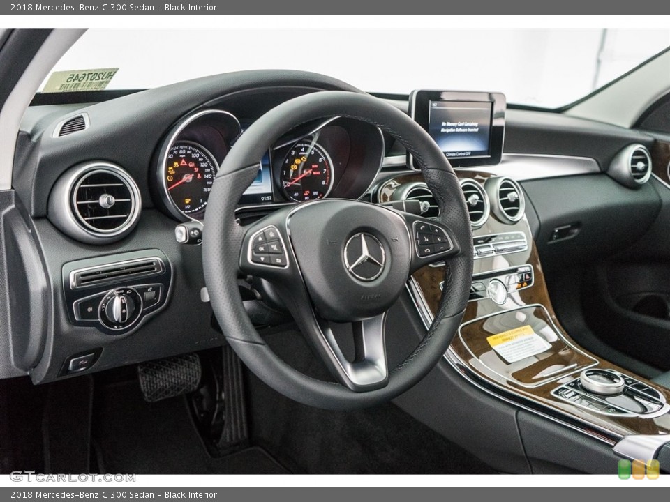 Black Interior Dashboard for the 2018 Mercedes-Benz C 300 Sedan #122461526