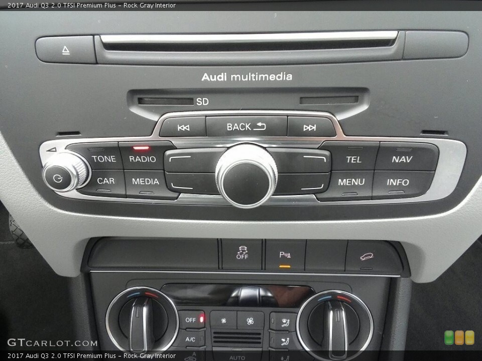 Rock Gray Interior Controls for the 2017 Audi Q3 2.0 TFSI Premium Plus #122471392
