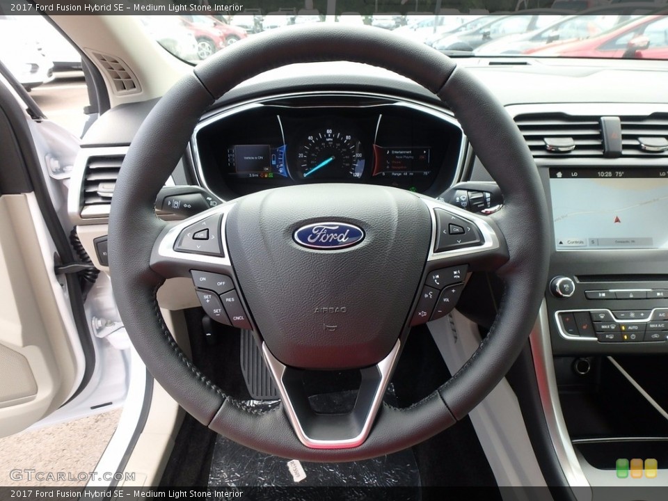 Medium Light Stone Interior Steering Wheel for the 2017 Ford Fusion Hybrid SE #122518577