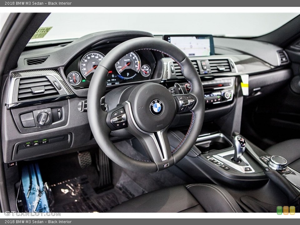 Black Interior Dashboard for the 2018 BMW M3 Sedan #122634541