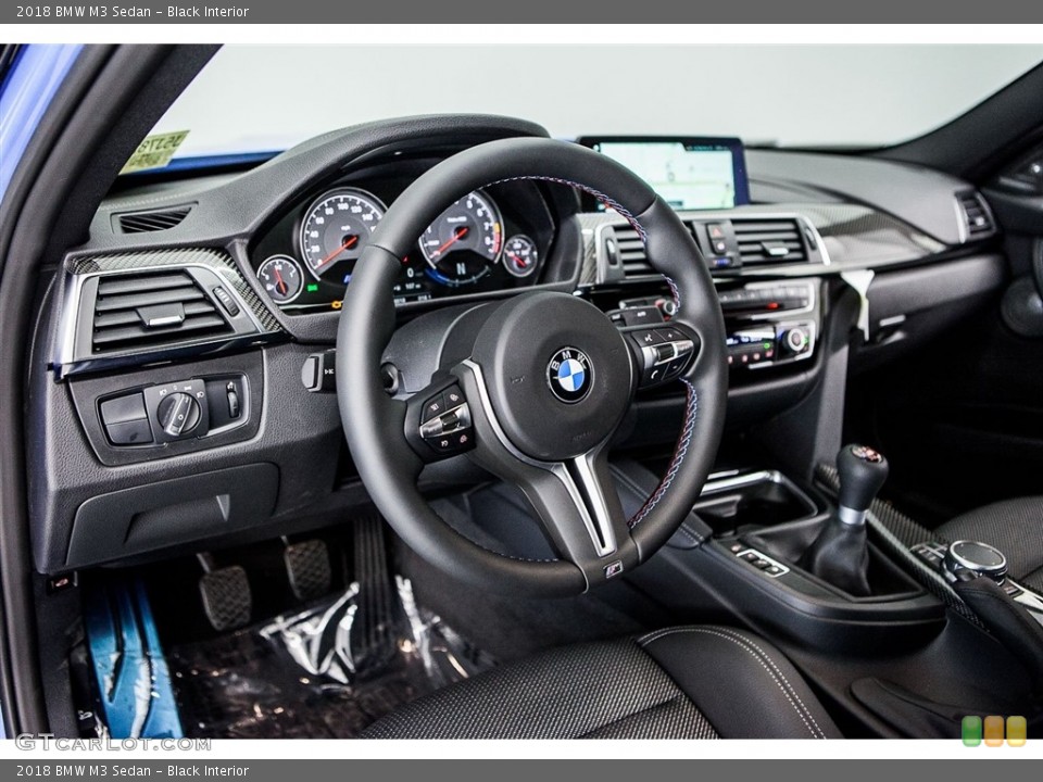 Black Interior Dashboard for the 2018 BMW M3 Sedan #122655401