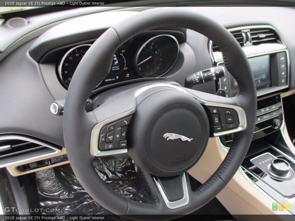Light Oyster Interior Steering Wheel for the 2018 Jaguar XE 25t Prestige AWD #122707682