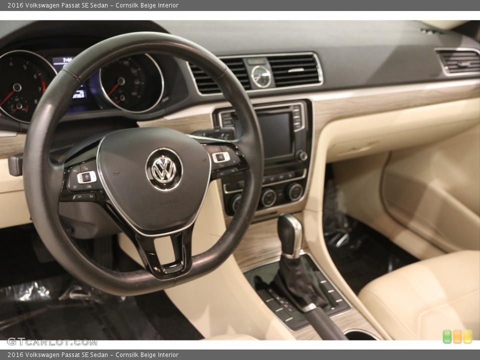 Cornsilk Beige Interior Dashboard for the 2016 Volkswagen Passat SE Sedan #122754236